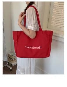 Large capacity red shoulder tote bag, casual commuting style, simple daily use accessory.