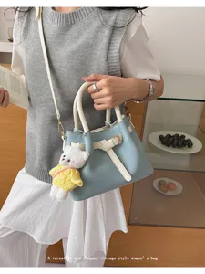 Stylish two-tone women handbag PU leather shoulder crossbody bag with cute bear pendant