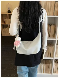 Detail view of a trendy large capacity dumpling shoulder bag, stylish daily use.