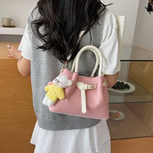 Korean style pink handbag with white handles, cute bear pendant, trendy shoulder bag for women.
