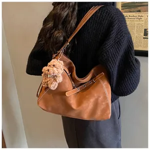 Retro brown hobo shoulder bag for women, large capacity casual tote with cute bear pendant.