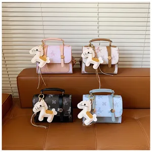 Chic small handbag set with cute horse charm, stylish crossbody and shoulder bag.