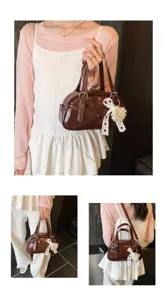 Korean niche bowling handbag for women, versatile stylish shoulder and crossbody commuting bag.