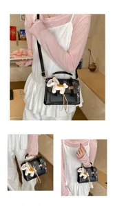 Chic women crossbody handbag with horse charm, stylish black shoulder bag for daily wear.