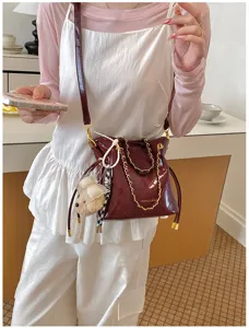 Chic quilted shoulder bucket bag for women, stylish commuting handbag with cute bear charm