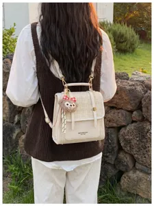 Korean style contrast color tweed backpack detail, versatile daily shoulder bag with cute bear charm.