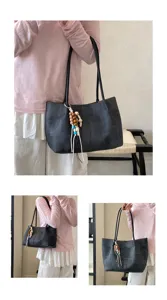 Korean minimalist black tote bag detail shot showing large capacity design and cute bead charm.