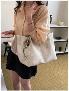 Korean style minimalist canvas tote bag for women, cute large capacity casual shoulder bag detail.