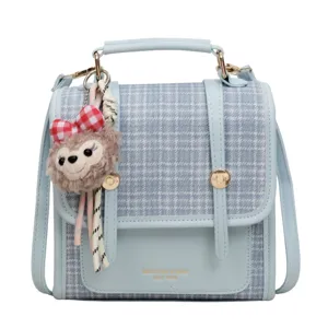 Chic blue plaid PU leather shoulder bag for women, vintage crossbody bag with cute plush pendant.