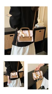 Stylish women small square crossbody bag with top handle and cute horse charm detail.