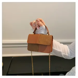 Retro style patchwork crossbody shoulder bag with chain, stylish small handbag for women.