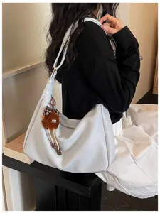 Casual large capacity women shoulder bag simple soft leather hobo bag with cute charm