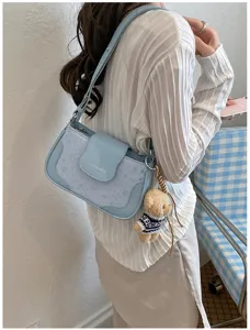 Light blue PU leather shoulder underarm bag with cute teddy bear plush pendant star