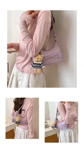Purple shoulder bag for women with star pattern and cute bear pendant, vintage style hobo bag.