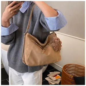 Casual retro khaki shoulder bag for women, large capacity tote with cute bear charm.