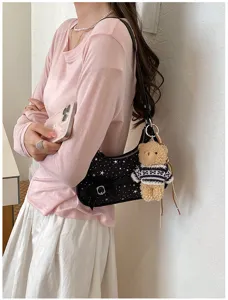 Vintage black star print shoulder bag with cute bow and plush bear pendant for autumn women.