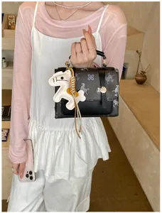 Fashionable mini handbag for women with chic horse print design, elegant and versatile.