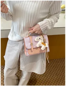 Stylish women pink small handbag with cute horse charm trendy shoulder bag for daily outfit
