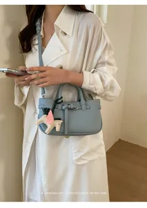 Retro litchi pattern women shoulder crossbody handbag with elegant design and charm detail style.