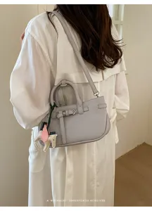 Retro litchi pattern leather shoulder bag for women, elegant mini crossbody bag daily use.