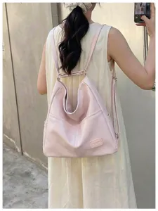 Pink leather hobo backpack for women, large capacity retro casual versatile multi-use bag.