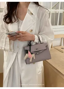 Minimalistische retro dames handtas handvat crossbody tas schoudertas met hanger.