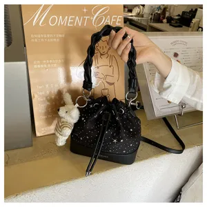 Korean style pleated bucket bag for women, stylish shoulder and crossbody handbag with charm.