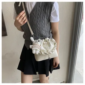 Korean pleated bucket bag for women, trendy casual shoulder crossbody bag with cute rabbit charm.