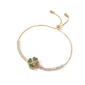 Gold-plated four-leaf clover adjustable bracelet with green and white sparkling cubic zirconia diamonds.