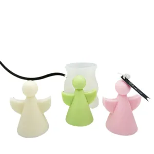 Detailed view of the 3D angel silicone mold and handmade scented candle set for crafting.