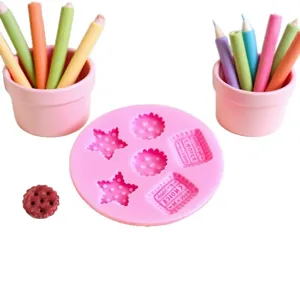 Set di stampi in silicone rosa per biscotti, pasticceria, fondant e candele fai da te.