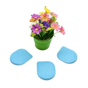 Plastic semi-circular cake scraper for baking and cream smoothing, essential DIY pastry tool.