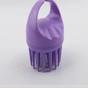 Lilafarbene Silikon Kopfmassagebürste mit ergonomischem Griff und weichen Borsten