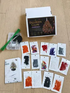 Complete DIY beaded tree kit with colorful beads, wire, and base in a gift box