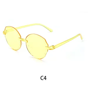 Occhiali da sole per bambini color caramella bordo ondulato elegante giallo trasparente sole