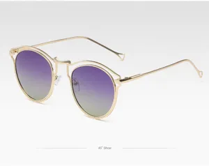 Lunettes de soleil polarisées à monture en métal doré avec verres dégradés violets pour la mode.