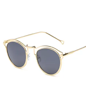 Lunettes de soleil rondes classiques avec monture métallique pour hommes et femmes.