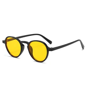 Klassische runde Sonnenbrille mit leuchtenden gelben Gläsern für Damen und Herren UV Schutz.