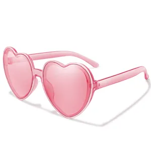 Stylish pink heart-shaped sunglasses for women, trendy party eyewear and daily fashion accessory.