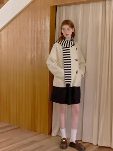 Cozy black and white striped scarf, creative design for autumn and winter daily wear.
