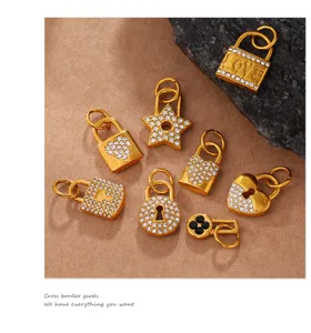 Detailed view of various gold rhinestone lock pendants in heart and star shapes