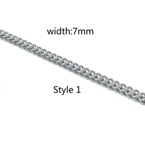 Close-up detail of 7mm width stainless steel dragon bone chain necklace in silver tone, style 1.