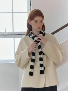 Classic black and white striped knit scarf, stylish narrow design for versatile daily wear.