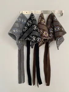Fair Isle jacquard knit triangle scarf detail, retro patterned headscarf with long ties.