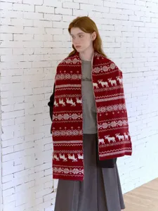 Detailed view of the Fair Isle double-sided moose jacquard knitted scarf for winter cozy styling.