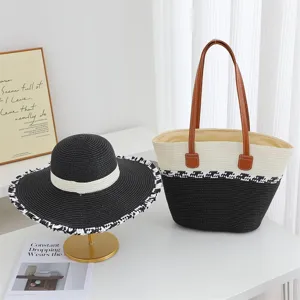 Handmade woven straw tote bag and sun hat set, black and white color block, summer beach vacation.
