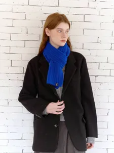 Cozy wool-blend ribbed knit scarf in vibrant blue, stylish winter neck warmer for daily wear.