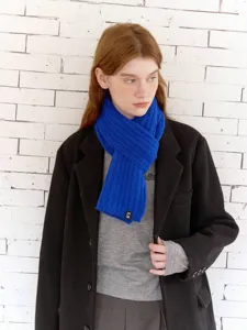 Blue knit wool scarf for winter, cozy ribbed design, stylish fashion neck warmer for cold days.