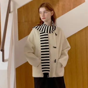 Chic black and white striped knit scarf, soft warm winter accessory, elegant stylish look.