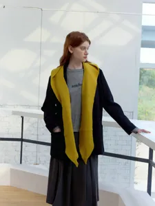 Stylish yellow knitted shawl scarf hoodie all-in-one, perfect for autumn and winter warmth.